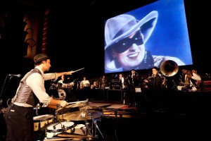 21 November 2012: Ben Shaw leads The Orkestra of the Underground perform a live score at the premiere of "Fearless Nadia" , a feature film celebrating the exploits of Perth born Mary Ann Evans who gained fame as a film star heroine in India in 1920's Bombay as Fearless Nadia; an Indian film actress and stuntwoman, who is remembered as the masked, cloaked adventuress in Hunterwali, an early female lead. The film is scored by a big band led by Ben Walsh in front of a live audience. Pictures  by Graham Crouch/OzFest.